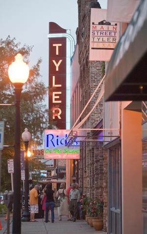 Primary view of object titled '[Vibrant Life on Main Street: A Twilight Stroll in Tyler, Texas]'.