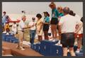 Photograph: [Texas Special Olympics athletes on awards stands]