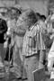 Photograph: [A man in a striped shirt at the Branch Davidian Annual Reunion]