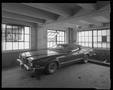 Primary view of [Car in a garage with an open window]