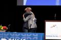 Primary view of [Chad West and Robert Emergy hugging, 2]