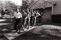 Photograph: [Fraternity brothers walking in a line]