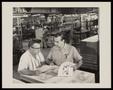 Photograph: [Men Working on Printing Press, 3]