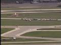 Video: [News Clip: Aircraft Takeoff and Taxi Scenes at the Airport]