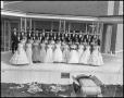Photograph: [A Capella Choir Posing for a Photograph on an Outside Stage, Novembe…