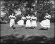 Photograph: [Six girls dancing on the lawn]