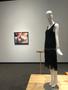 Primary view of [A 1920s beaded dress in front of a Nancy Lamb painting]
