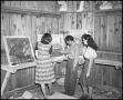 Thumbnail image of item number 1 in: '[Students Examining Art Work]'.