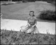 Photograph: [Billie Wolfe With Flowers]