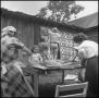 Primary view of [Women at an outdoor quilting bee]