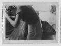 Photograph: [Woman Washing Her Hair in the Sink]