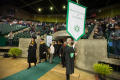 Primary view of [Graduates entering Coliseum during UNT Fall Commencement]