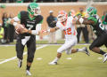 Photograph: [Football Players during UNT Homecoming game]