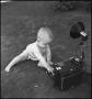 Photograph: [A baby with a camera, 3]