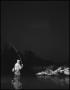 Photograph: [A man fishing at night, 7]