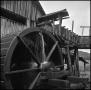 Photograph: [Water cascading from a mill wheel, 2]