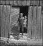 Photograph: [Otto Walker and Harry England going to fetch water]