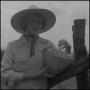 Photograph: [Portrait of a woman in a straw hat, 2]