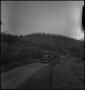 Photograph: [Mountain Funeral: Procession of Vehicles]