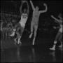 Photograph: [Basketball player attempts to make a shot, 3]