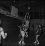 Photograph: [Basketball in mid-air at an intramural game]