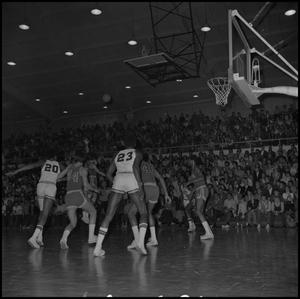 Primary view of object titled '[Basketball in mid air during a game, 3]'.