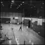 Photograph: [Men playing badminton in a gym, 9]