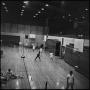 Photograph: [Men playing badminton in a gym, 8]