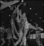 Photograph: [Basketball players collide in the air]