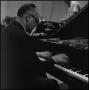 Photograph: [Man playing the piano]