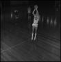 Photograph: [Basketball players on the court practicing]