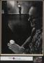 Photograph: [Slingshot John Milligan prepares to shoot an egg on Joe Clark's fing…