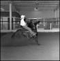 Photograph: [Close up of cowboy riding rearing horse]