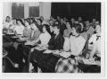 Photograph: [Students seated at desks in classroom]