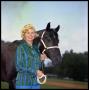 Photograph: [Ms. Stanfield with a Horse]