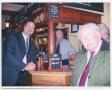 Photograph: [Cedric Dickens and man in bar]