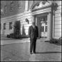 Photograph: [Dean A. Witt Blair standing outside of the Education-Home Economics …