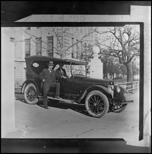 Primary view of object titled '[President William Bruce next to car]'.