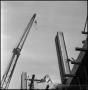 Photograph: [Crane and building under construction]