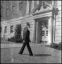 Photograph: [Dean A. Witt Blair walking outside of the Education-Home Economics B…
