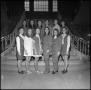 Photograph: [Organization members standing on stairs 1]