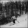 Photograph: [Man skiing down a hill]