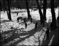 Photograph: [Children ice skating on a frozen creek]