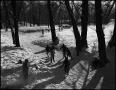 Photograph: [Children ice skating up a creek]