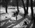 Photograph: [Children ice skating on a frozen creek, 2]