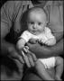 Photograph: [Junebug being held by his uncle, 2]