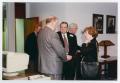 Photograph: [David Owsley shaking hands with attendees]