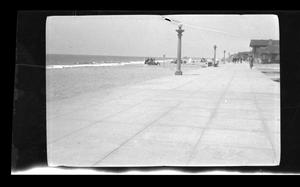 Primary view of object titled '[A boardwalk along a beach]'.