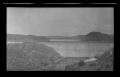 Photograph: [A dam and river in the desert]