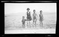 Thumbnail image of item number 1 in: '[Irene Williams and her sons standing in water on a shoreline]'.